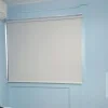 Light Grey Roller Blinds in Bedroom