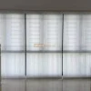 Semi-sheer roller blind in Geylang HDB Living Room