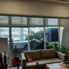 Sunscreen Roller Blind Grey White in Office at Burn Road