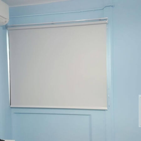 Light Grey Roller Blinds in Bedroom