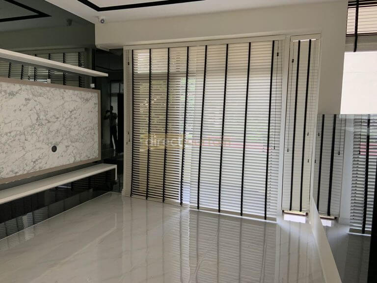 bright white venetian widow blinds in living room