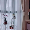 Day curtains with flower pots