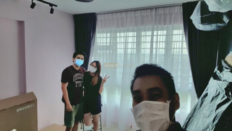 happy couple with curtains in Singapore